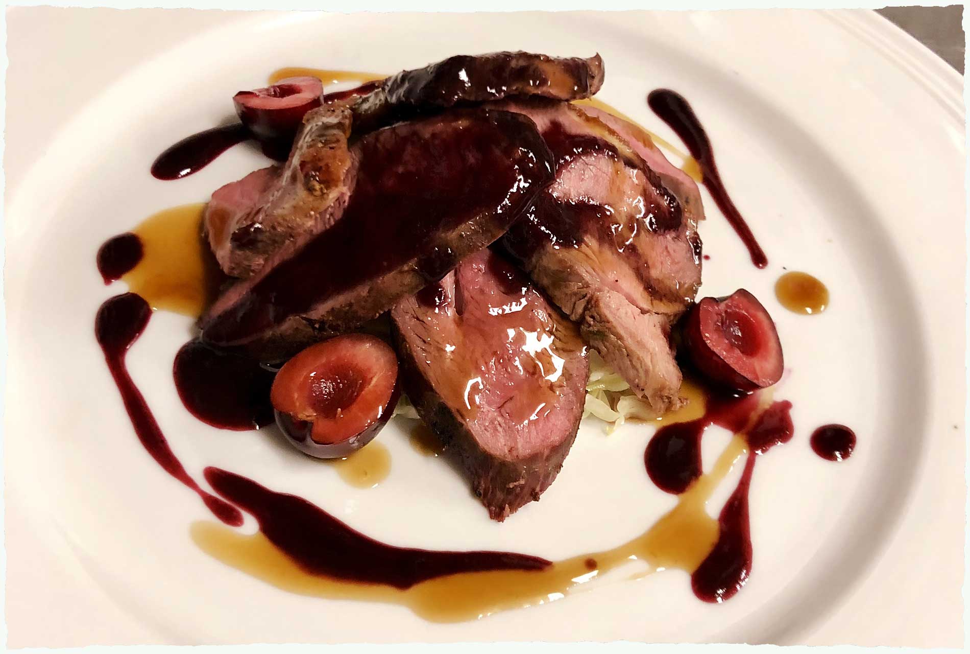 Sautéed Duck breast with local duroni cherries and Recioto wine sauce